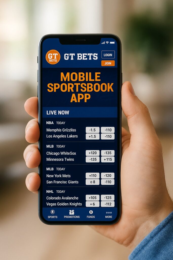 Person holding a smartphone displaying the GT Bets Mobile Sportsbook App interface with live betting odds for NBA MLB and NHL games focused on user-friendly design.